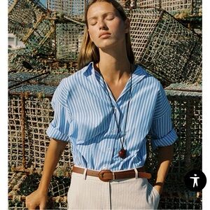 ZARA V-neck lapel collar shirt with long sleeves. Front button closure.